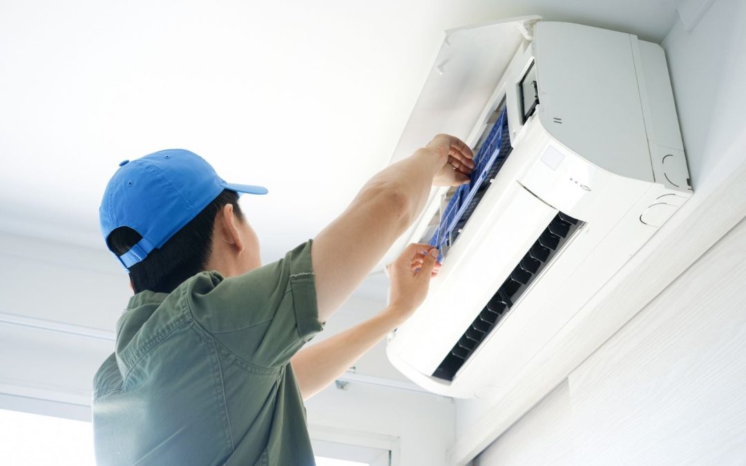 HVAC technician servicing a ductless mini split in Vacaville