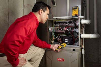 Furnace Repair Vacaville Heating technician diagnosing a furnace repair in Vacaville